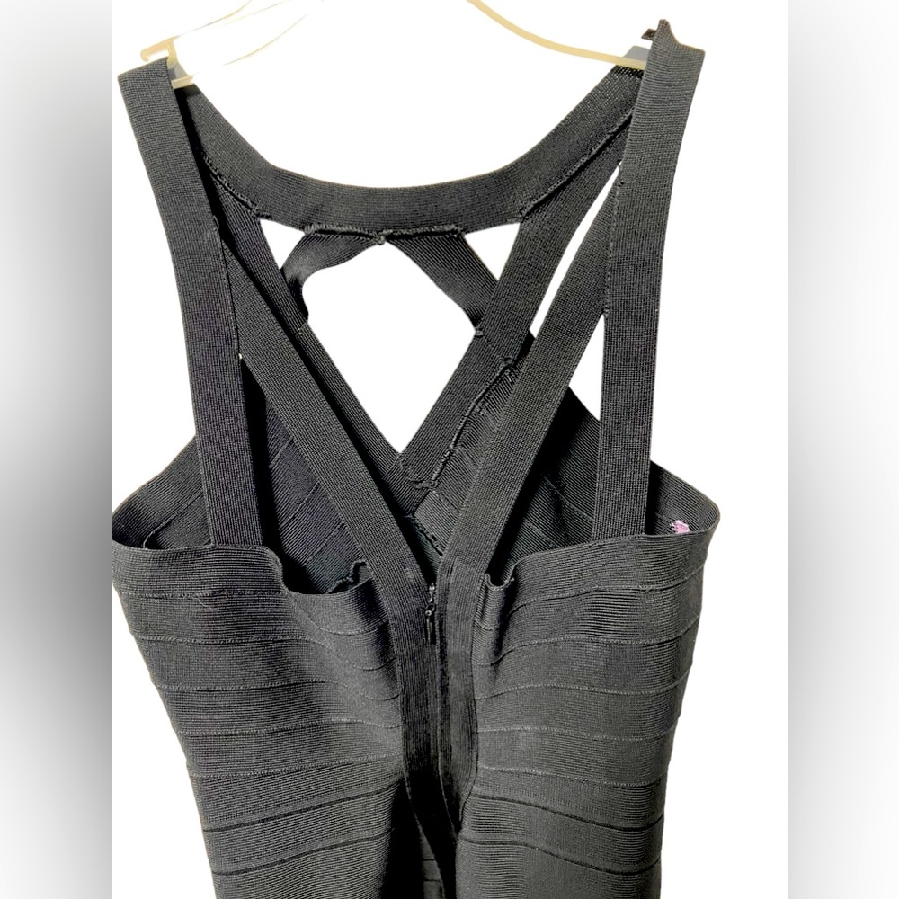 Tight bodycon Herve Leger black dress with spider back. Stunning